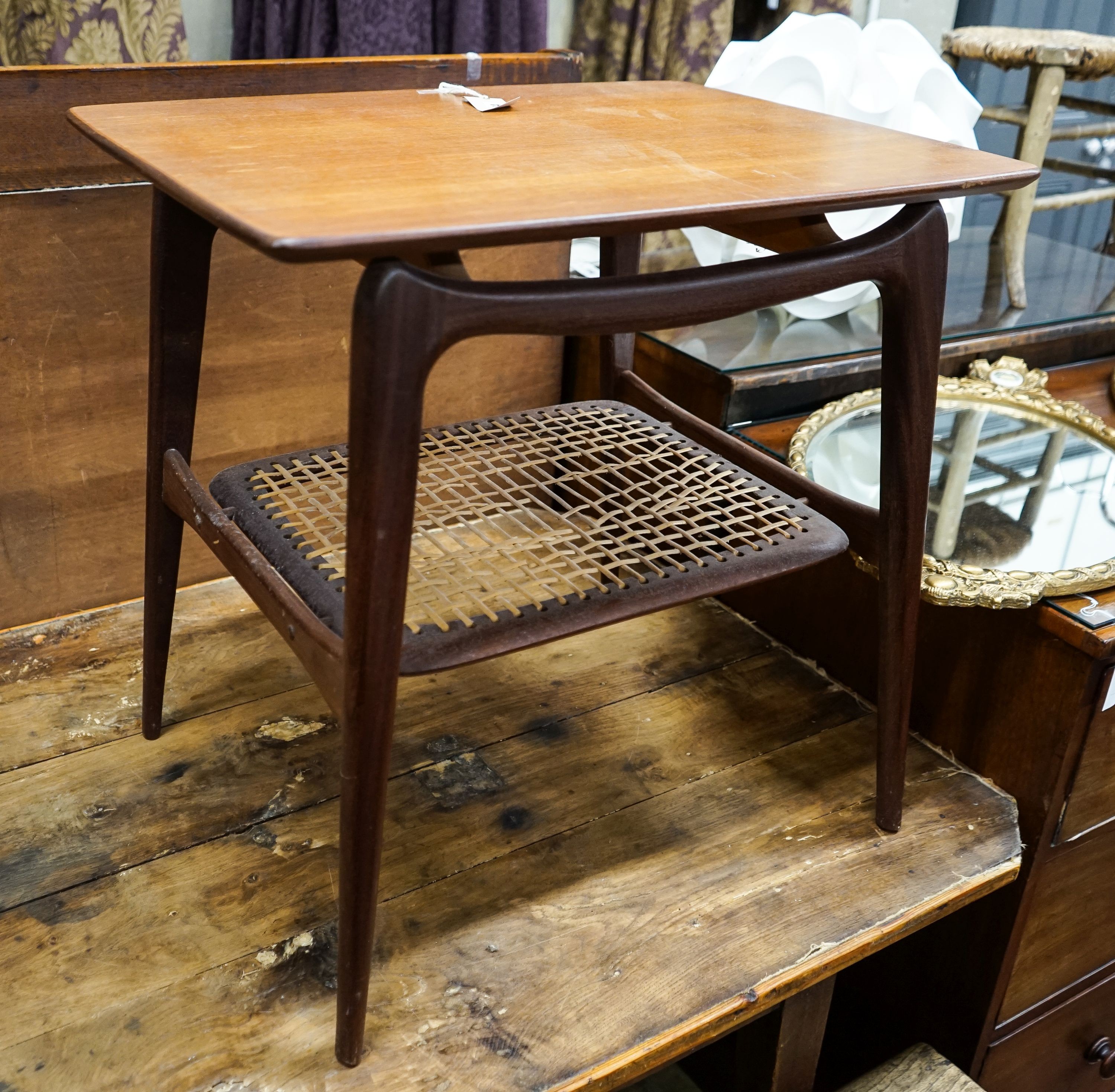 A Dutch 1950's 'Webe' rectangular teak occasional table attributed to Louis Van Teefellelen, with rattan undertier on plain tapered legs (label to underside), width 64cm, depth 49cm, height 63cm